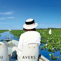 Per Boot auf Vogelpirsch am von Agua Pe (Wasserlilien) bedeckten Rio Bento Gomes - (c) Lou Avers