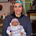 Artist Cristina Valenti with one of her selfmade real looking babies in her Café com Arte in Bento Goncalves 