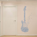 Music guitar wall art decal making a big statement in a hallway.