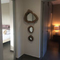 Small corridor with natural handmade mirrors 
