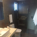 Bathroom 1: main bathroom, with modern walk in rain shower. Amenities available.