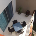 Balcony with view to the Garden and pool - the perfect place to star the day with a breakfast