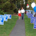 The Molenaars stroll a path lined with campaign messages.