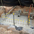2021 09 19 Ground 3 DTL traphouse pit. Slab poured. Note the drainage sump for a submersible pump.