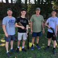 2021 03 06  Noel Tavendale (Green T shirt), a regular at Sporting Clays practice days, brought his son Nick and grandsons Jack & Toby for a shot. The boys did well.