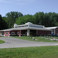 The building exterior is blended with adjacent buildings