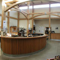 oval curved tasting bar for approach, crowds and the curve of a wine glass