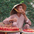 An old lady selling souvenirs - Hoi An, Copyright © 2013