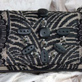 POCHETTE DA SERA IN TESSUTO RICAMATO CON PIZZO