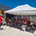 Welcome and entertainment at the Aouille chalet stand