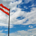 Austrian flag at the top of the fortress.