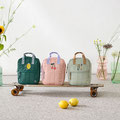 Kinderrucksack Square Lemon, Cherry & Khaki auf Skateboard - LÄSSIG