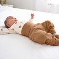 Baby liegend im Schlafsack von LÄSSIG