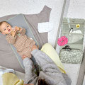 Baby wird gewickelt