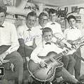 JOHNNY & HIS CELLAR ROCKERS (september 1961) In de kelder aan de Transvaalstraat 83,  links is de accordeon van Jan zichtbaar vlnr: Hans Kuyt - Jan Akkerman - Jan Burgers - Cor Engelsma - Pierre van der Linden voorgrond: Cocky Akkerman (met grote Höfner g