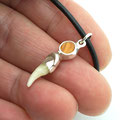 Schmuck mit Katzenzahn
