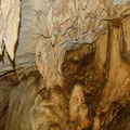 Stalactites and stalagmites in the main room of the cave.