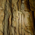 Stalactites and stalagmites in the main room of the cave.