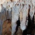 Stalactites hanging from the ceiling. 