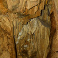 Stalactites and stalagmites in the main room of the cave.