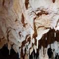 Stalactites hanging from the ceiling. 