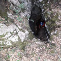 Descending the vertical cave. 