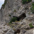 Entrance to the cave above the rocks. 