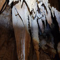 Stalactites hanging from the ceiling. 