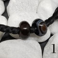 15. Schwarzer Achat (mit oder ohne Einschlüssen)