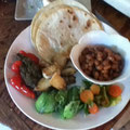 4 corn tortillas, beans, tiny avocado, tomatoes, salsa, 2 slices of chicken (so full)
