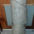 A large roll of Burlap material