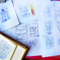 This is what my first comic layouts look like. All of them. They're usually about the size of 2 paperclips and help me think through the positioning of panels. 