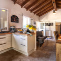 Fully equipped kitchen with a view to Montalto