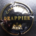 Marque : DRAPPIER N° Lambert : 7 - or vif Couleur :  Noir et or striée Description : Nom de la marque au-dessus d'armoiries surmontée d'une couronne et soutenue par deux lions  Emplacement : 