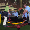 Standing see saw in use at a trade show