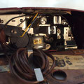 This is the inside of the Zenette, you can see it's four glass vacuum tubes if you look closely.