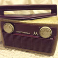1957 Motorola tube portable, the handle rotates.