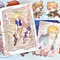 新刊とノベルティポストカード。ポストカードはきらきらします。