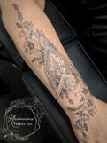 Ornamental fineline floral flower tattoo