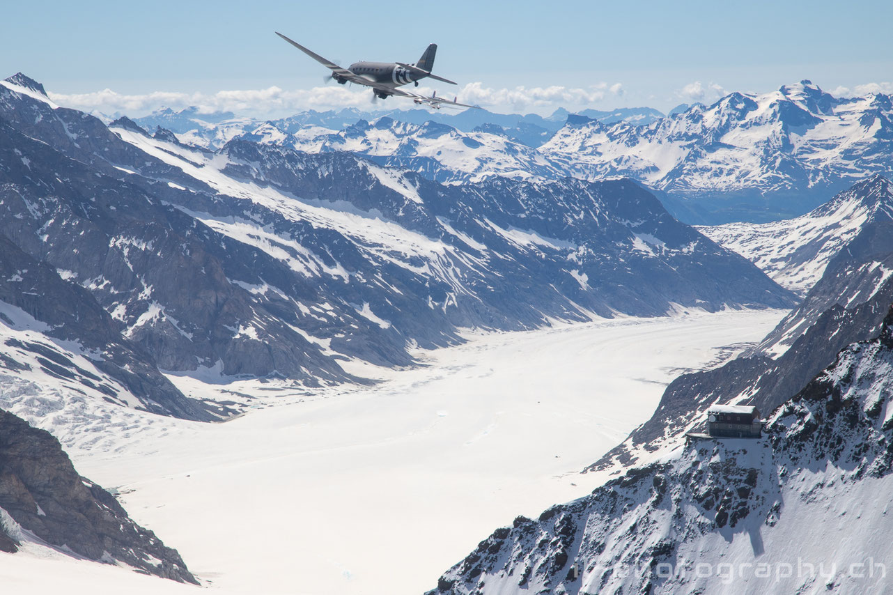 Douglas DC-3 C-47 Placid Lassie and two Classic Formation Beech 18 in the Swiss Alps.