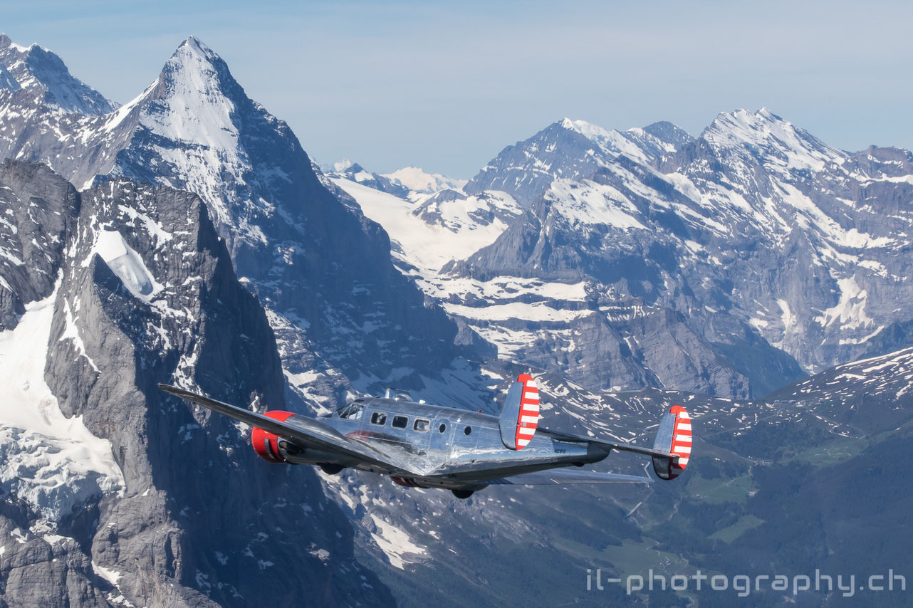 Douglas DC-3 C-47 Placid Lassie and two Classic Formation Beech 18 in the Swiss Alps.
