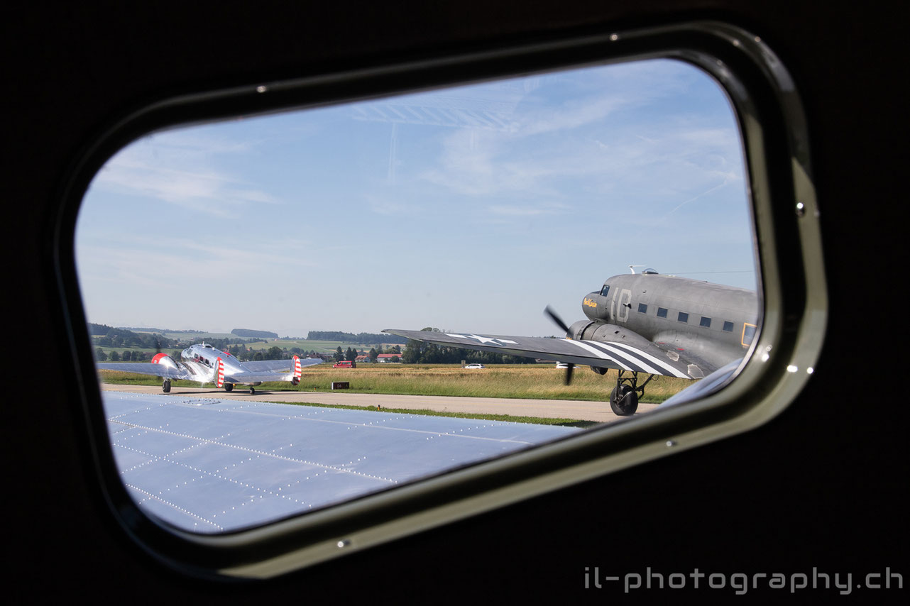 Douglas DC-3 C-47 Placid Lassie and two Classic Formation Beech 18 in the Swiss Alps.