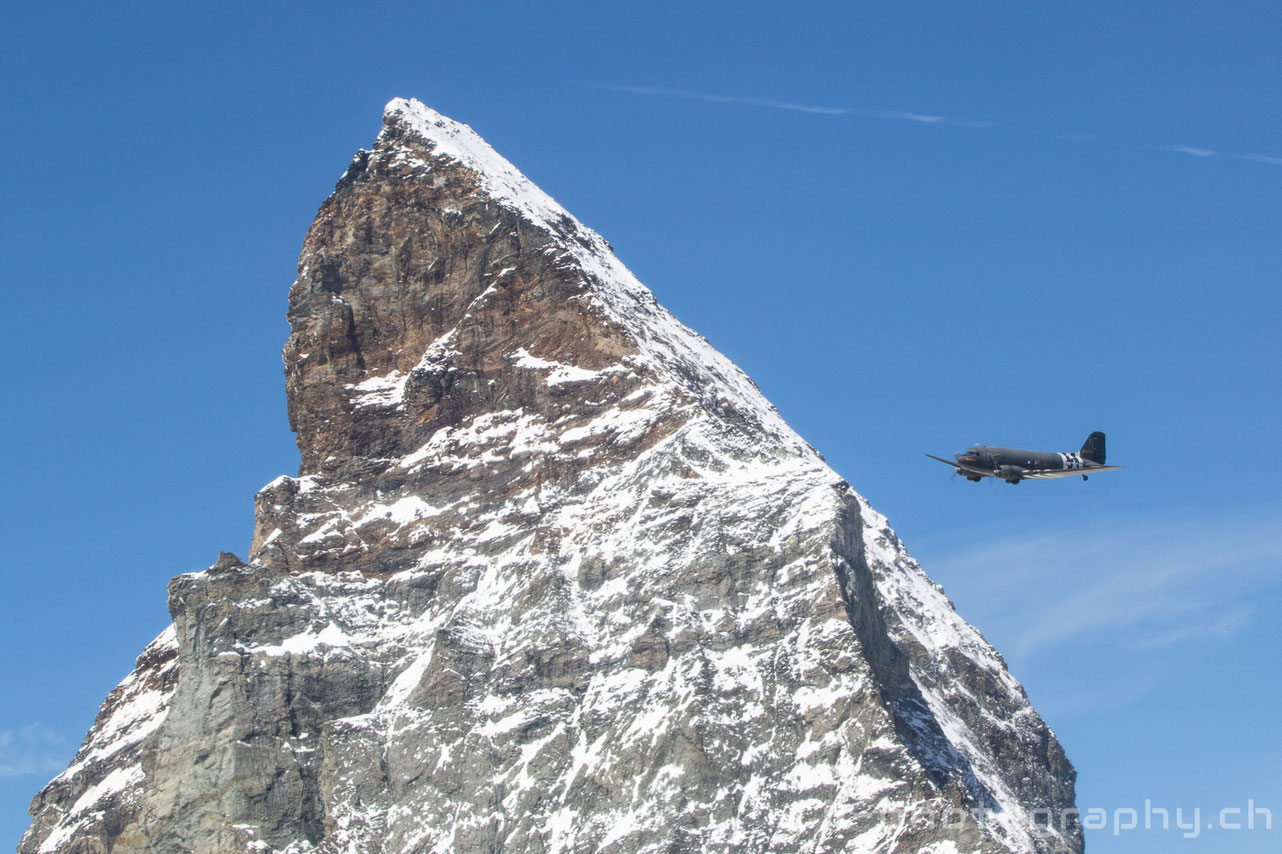 Douglas DC-3 C-47 Placid Lassie and two Classic Formation Beech 18 in the Swiss Alps.