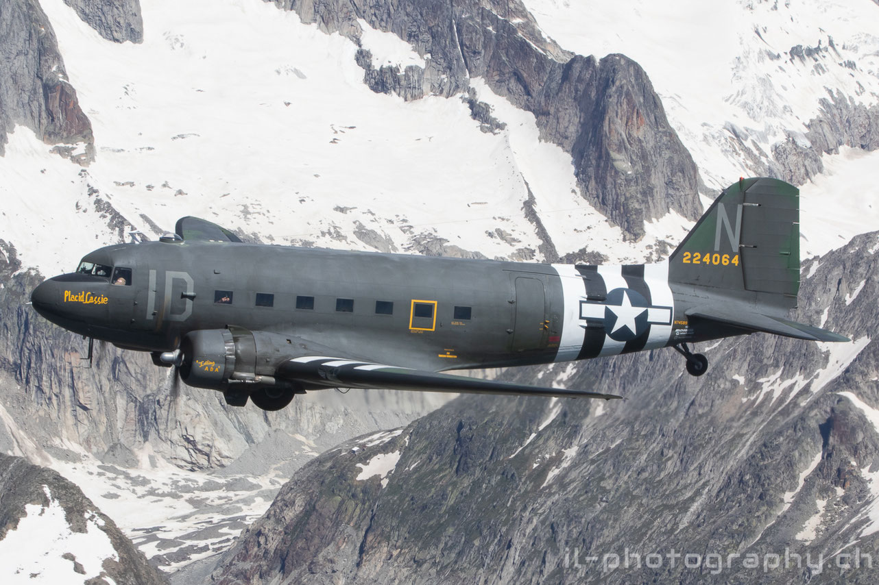 Douglas DC-3 C-47 Placid Lassie and two Classic Formation Beech 18 in the Swiss Alps.