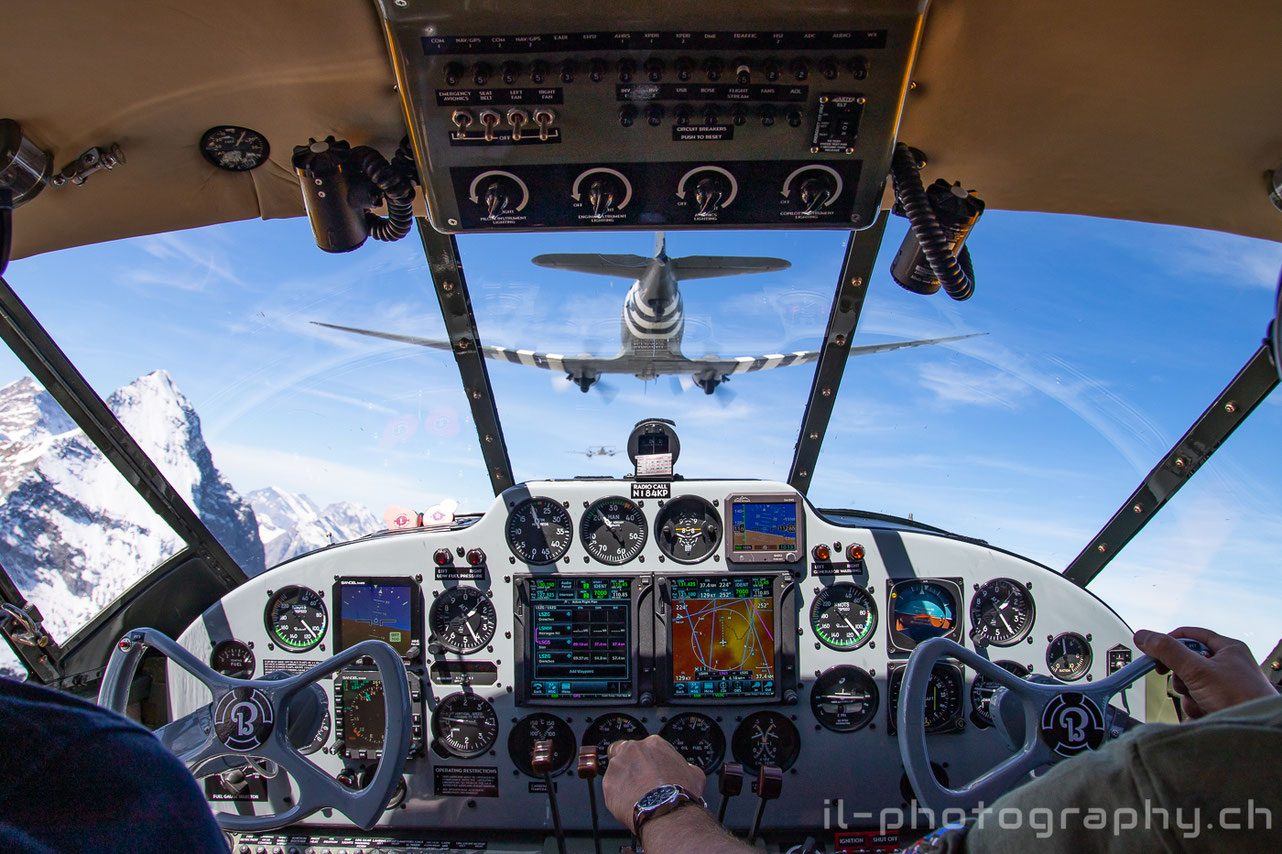 Douglas DC-3 C-47 Placid Lassie and two Classic Formation Beech 18 in the Swiss Alps.