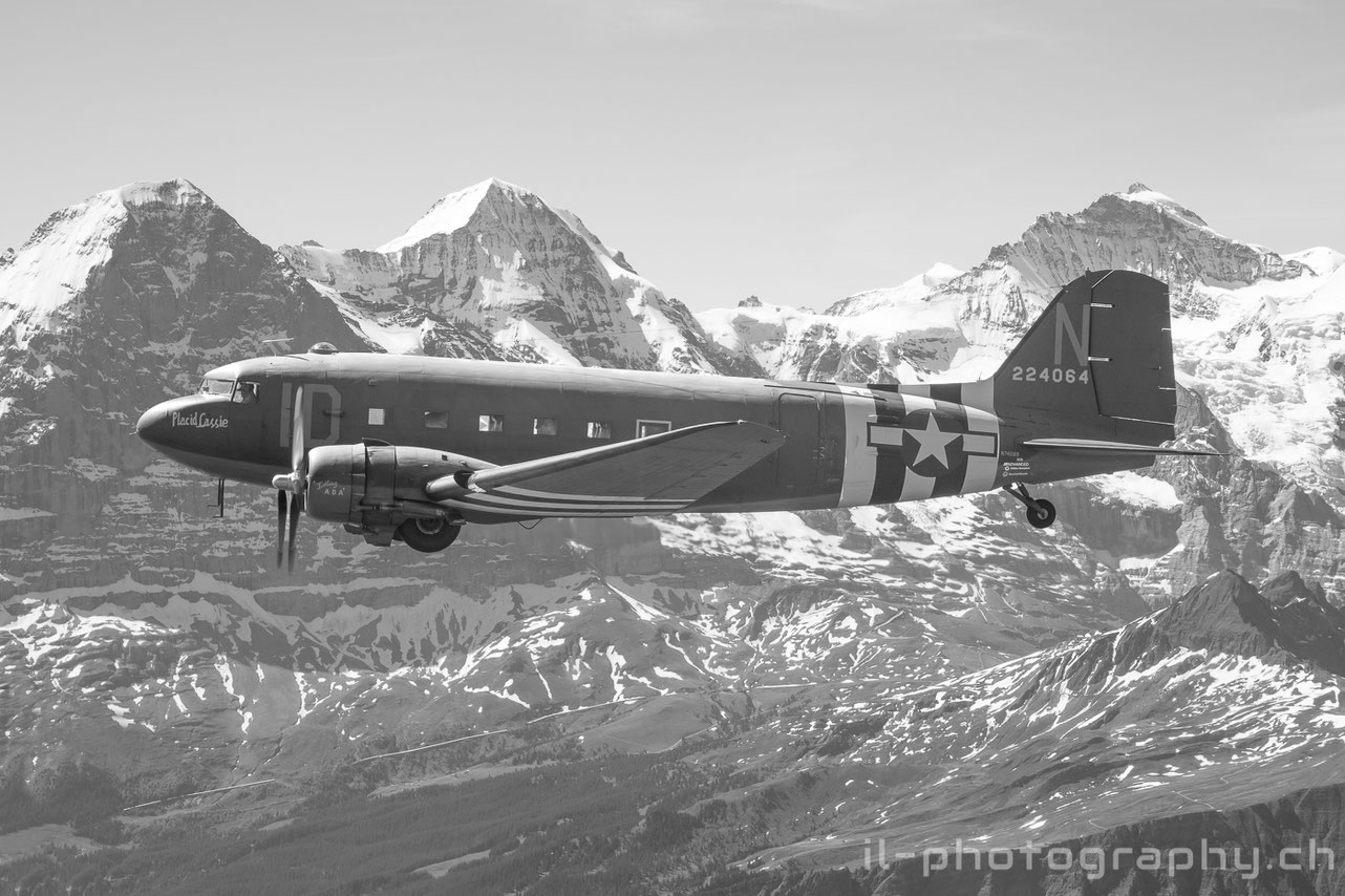 Douglas DC-3 C-47 Placid Lassie and two Classic Formation Beech 18 in the Swiss Alps.