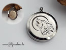 MO 21: Edelstahlmedaillon mit einem Wolfelement. Grösse 30mm. Preis: 52 Euro