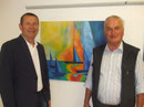 Alois Riedler mit Edmund Gruber vor einem Bild von Koll. Karl Bonstingl