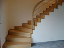 Escalier en chêne avec garde corps arrondi et tube inox