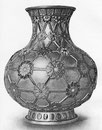 Vase réticule, fleurs en relief, repoussées, dorées et émaillées en couleurs.